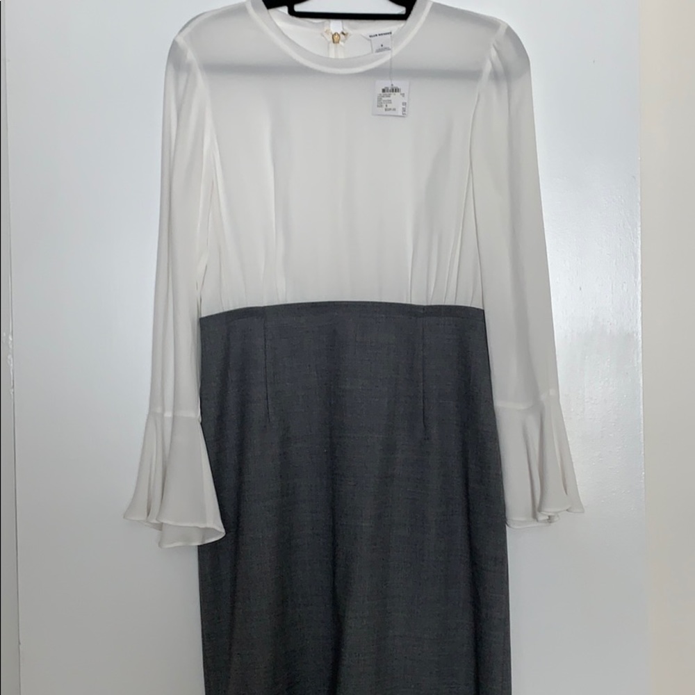 Sheer top dress with grey wool skirt